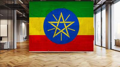 Close-up of old metal wall with national flag of Ethiopia. Concept of Ethiopia on export-import, storage of goods and national delivery of goods. Flag in grunge style Wall mural