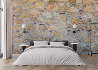 close up of the walls made of stone , stone background. Wall mural