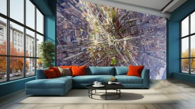 Helicopter drone shot. Aerial photography of a modern city over an area, a large crossroads, high-rise buildings, a park and roads. Panoramic city shot from above Wall mural