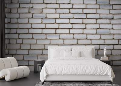 Wall is made from bricks and painted with white color. Wall mural