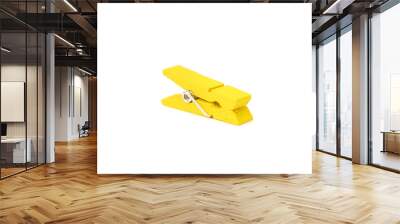 Yellow plastic clothespin isolated on white background Wall mural