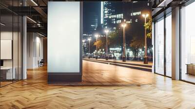 Blank white vertical digital billboard poster on city street bus stop sign at night, blurred urban background with skyscraper, people, mockup for advertisement, marketing Wall mural