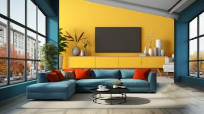 Modern living room with TV on yellow wall and wooden plate over cabinet Wall mural