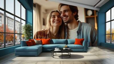 Photo of happy young couple move new place enjoy live together talking communication have fun new apartment room light house flat indoor Wall mural