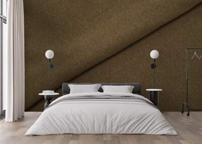 Pleats on fabric, knitted material of khaki color, folds Wall mural