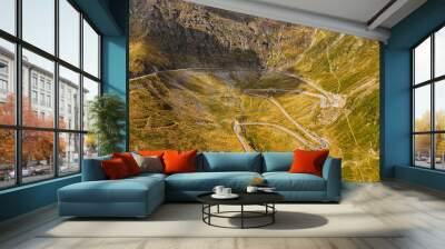 Top cinematic aerial view to the Transfagaras famous curvy road in Romania. Aerial view of Transfagarasan road in Fagarash Mountain. Wall mural