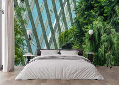 Modern concept of urban greening. Combination of metal structures with plants. Wall mural