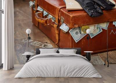 old-fashioned leather suitcase full of money Wall mural