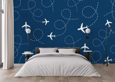 Airplane flying with line path seamless pattern. Plane travel concept on blue background. Vector illustration. Wall mural