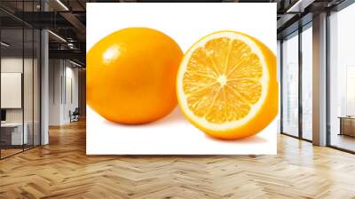 Fresh orange Tashkent lemons or Meyer lemons, one whole and one half isolated on white background with shadow Wall mural