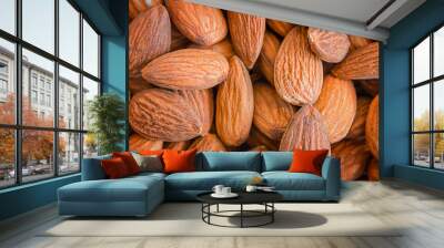 Almond background. Close-up of raw almonds, full frame. Wall mural