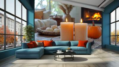 Cozy autumn evening with candles, a pumpkin, and a warm fireplace glow. Generative AI. Wall mural