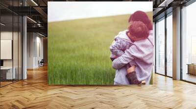 mom and baby hugs Wall mural