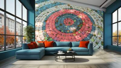 a mosaic of paving stones.multi-colored paving stone laid out in a circle Wall mural