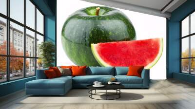 Contrived image of a green apple shaped like a watermelon next to a sliced ​​slice Wall mural