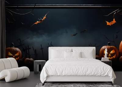 Spooky Halloween night with carved pumpkins and flying bats under a dark sky Wall mural