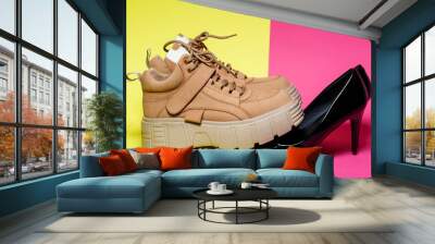 Fashionable women's shoes. Big brown leather shoes and black patent leather shoes. Wall mural