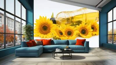 A bottle of sunflower oil sitting next to sunflowers Wall mural