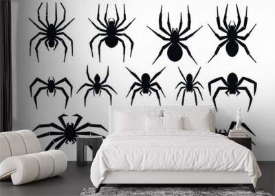 A collection of spider silhouettes on a white background Wall mural