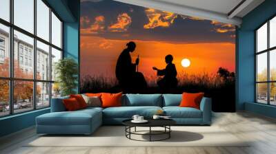 A couple standing together in a field as the sun sets, with a beautiful sky and landscape Wall mural