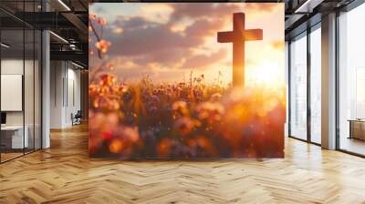 A cross standing in a vibrant field of flowers. Suitable for religious themes or nature concepts Wall mural