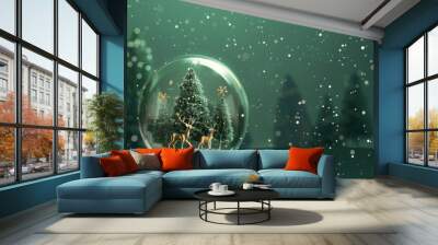 A festive snow globe with a Christmas scene inside Wall mural