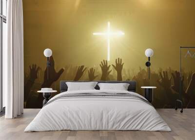 A group of people praying together in front of a crucifix Wall mural