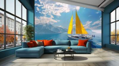 A sailboat with a yellow sail sailing in the open ocean Wall mural