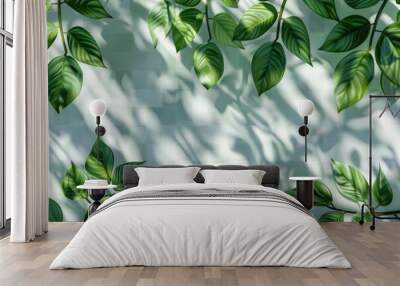 Vibrant green leaves against a clean white wall, perfect for interior design projects Wall mural