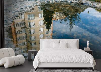 Reflection in the water of the building Wall mural