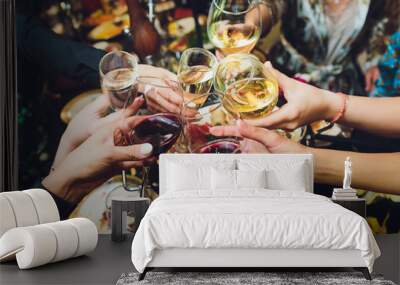 Champagne glasses in hands of people at party. Wall mural