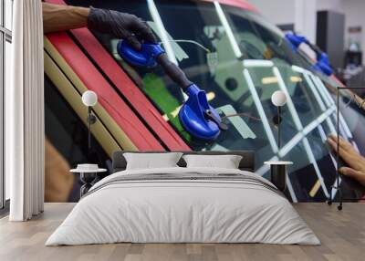 Installing windshield on a car with automotive design Wall mural