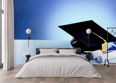 graduation hat with a diploma on a blue background. getting an education. the end of the school year Wall mural