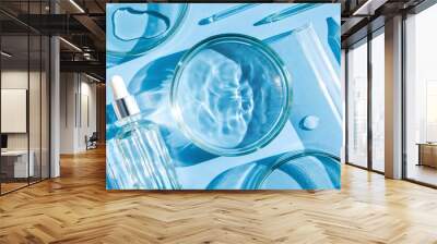 serum in petri dishes on light blue background cosmetic research concept	
 Wall mural