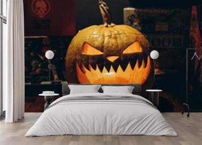 Glowing Jack-o'-lantern pumpkin with scary face for Halloween decoration Wall mural