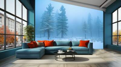 A snowy forest with trees covered in snow Wall mural