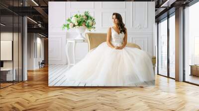 beautiful young woman in wedding dress beautiful makeup and hairstyle happy bride Wall mural