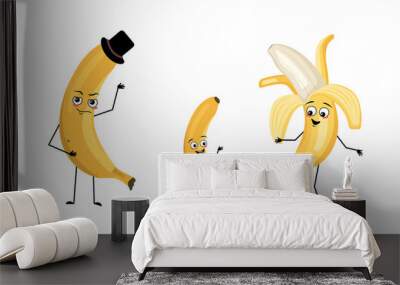 Family of banana fruit characters with happy emotions, smile face, happy eyes, arms and legs. Mom is happy, dad is wearing hat and child is dancing. Vector flat illustration Wall mural