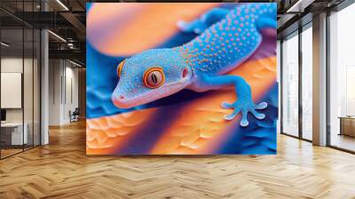 Bright blue and orange gecko on a smooth, abstract surface, set against a soft gradient background. Wall mural