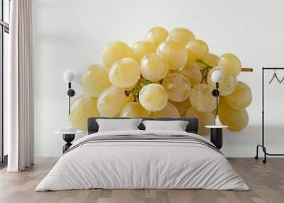 A bunch of grapes are sitting on a white background Wall mural