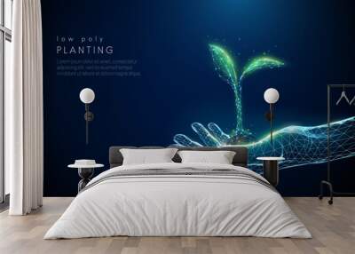 Abstract giving hand with young plant in earth. Wall mural