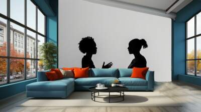 Silhouette of two people facing each other at sunset Concept confrontation communication reflection digital art Wall mural