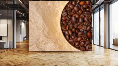 coffee grains in a round wooden jar on a background of crumpled parchment Wall mural