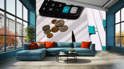 Calculator, documents, coins, computer mouse and pen on desktop.Business concept Wall mural