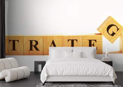 On a light background, wooden cubes with the text STRATEGY Wall mural