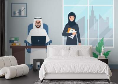 Arab business man and woman working in office. Wall mural