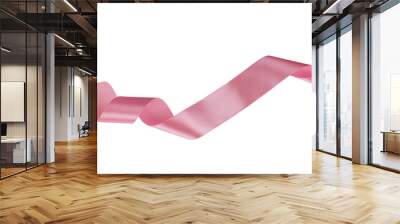 satin pink ribbon, twisted on a table, isolated on a white background Wall mural