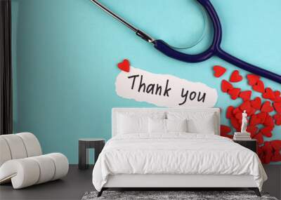 The phrase Thank you on a banner. Gratitude to healthcare staff. Heroes. People who saves lives. Thankfulness. Life Wall mural