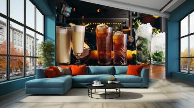 Classic long drink cocktails on the table. Mojito, long island and pina colada Wall mural