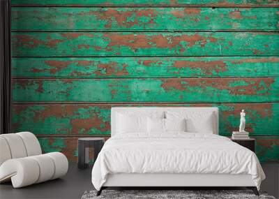 wooden planks covered with green old peeling paint background Wall mural